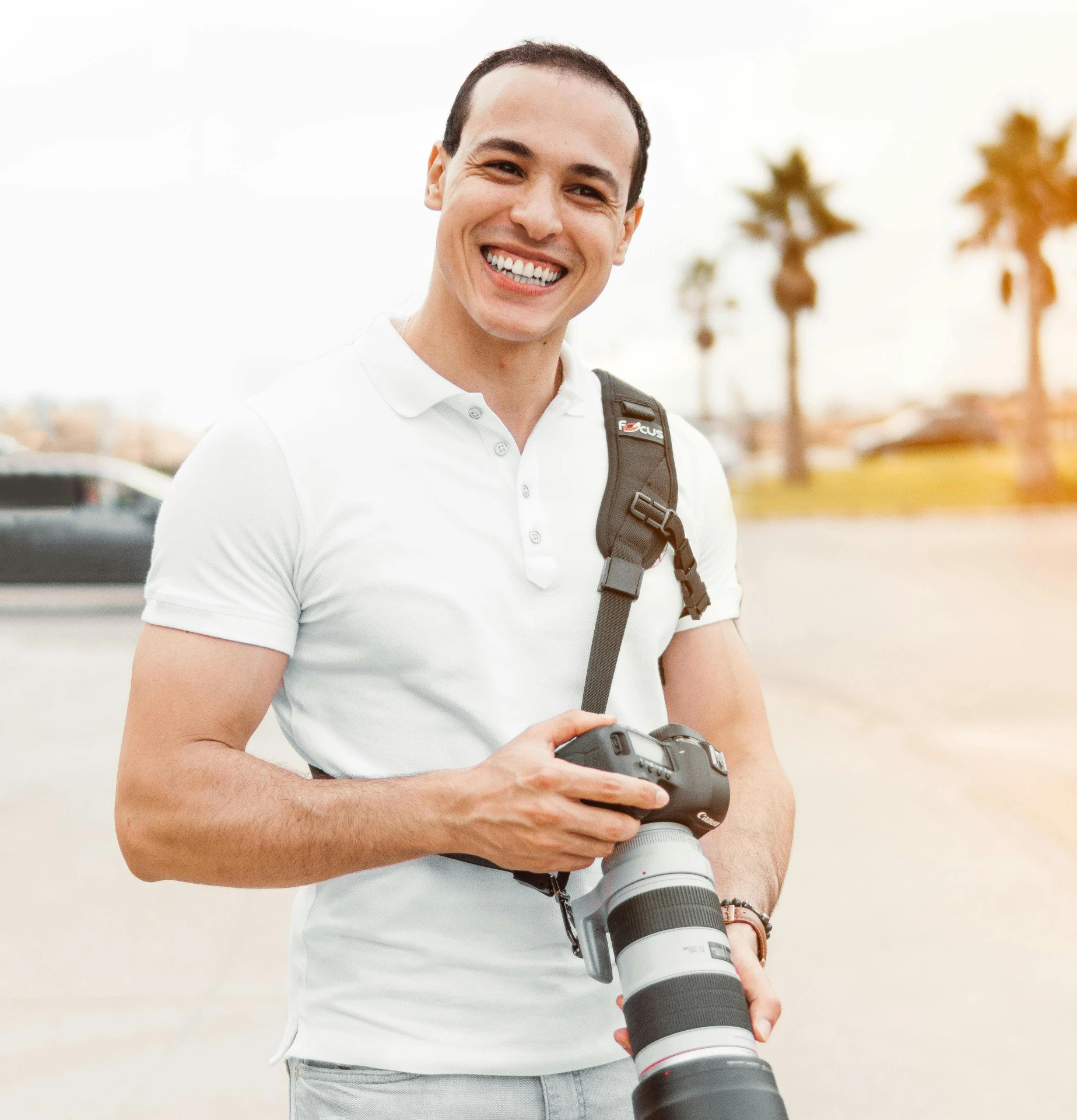 Photo of photographer with his viewfinder as subject with a woman in view